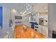 Open-concept dining area flows into a kitchen with a breakfast bar, ideal for entertaining at 4516 Renwick Dr, Parrish, FL 34219