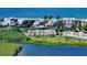 Aerial view of a lovely condo with coastal scenery and beach in the backdrop at 4600 Gulf Of Mexico Dr # 202, Longboat Key, FL 34228