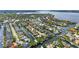 Scenic aerial view of a waterfront community with houses along canals at 4616 Blue Marlin Dr, Bradenton, FL 34208