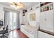 Versatile bedroom with a built-in daybed, storage cabinets, and a door to the outside at 4616 Blue Marlin Dr, Bradenton, FL 34208