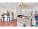 Open living room with ceiling fan, hardwood floors, and comfortable seating at 4616 Blue Marlin Dr, Bradenton, FL 34208