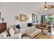Comfortable living room with tile flooring, neutral furnishings, and modern decor for relaxed living at 4616 Blue Marlin Dr, Bradenton, FL 34208