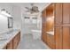 Elegant main bathroom boasts a soaking tub, dual vanities, and tiled floors for a spa-like experience at 4616 Blue Marlin Dr, Bradenton, FL 34208