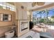 Covered outdoor kitchen features a stainless steel grill, bar, and outdoor seating for entertaining at 4616 Blue Marlin Dr, Bradenton, FL 34208