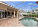 Inviting pool area featuring an outdoor dining space and seating lounge, perfect for relaxation at 4616 Blue Marlin Dr, Bradenton, FL 34208