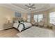Serene main bedroom suite offers a relaxing retreat with natural light and stylish decor at 4632 Benito Ct, Lakewood Ranch, FL 34211