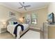 Comfortable bedroom featuring a cozy bed, ample natural light, and contemporary decor at 4632 Benito Ct, Lakewood Ranch, FL 34211