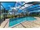 This screened-in pool offers a tranquil space with lush landscaping and clear blue water at 4632 Benito Ct, Lakewood Ranch, FL 34211