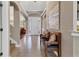 Bright foyer with tile flooring, arched doorways, and a decorative bench, creating an inviting entrance at 4724 Tilden Park Ct, Bradenton, FL 34211