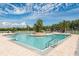 Stunning community pool with clear blue water and lounge areas at 4839 Turtle Bay Ter, Bradenton, FL 34203