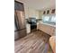 Well-lit kitchen featuring stainless steel appliances, ample cabinet space, and modern finishes at 508 51St W Ave, Bradenton, FL 34207