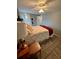 Cozy main bedroom with a comfortable bed, ample closet space, and contemporary decor at 508 51St W Ave, Bradenton, FL 34207