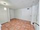 Finished basement with tile flooring, white walls, recessed lighting, and a storage closet at 611 19Th W Ave, Palmetto, FL 34221