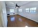 Bedroom featuring hardwood floors, natural light, and ceiling fan at 611 19Th W Ave, Palmetto, FL 34221