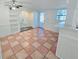 Dining area with tile floors, built-in shelving, and natural light at 611 19Th W Ave, Palmetto, FL 34221