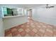 Dining area with tile floors open to kitchen at 611 19Th W Ave, Palmetto, FL 34221