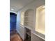 Hallway with recessed lighting and built-in shelving at 611 19Th W Ave, Palmetto, FL 34221