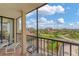 Relaxing balcony space with views of the community and lush landscaping at 6158 Palma Del Mar S Blvd # 504, St Petersburg, FL 33715