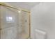 Modern bathroom featuring a glass shower and a standard toilet at 6158 Palma Del Mar S Blvd # 504, St Petersburg, FL 33715