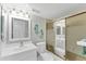 Well lit bathroom featuring a new sink, toilet and shower at 6158 Palma Del Mar S Blvd # 504, St Petersburg, FL 33715