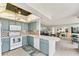 Open concept kitchen with ample counter space flows into the living area at 6158 Palma Del Mar S Blvd # 504, St Petersburg, FL 33715