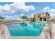 Inviting community pool with clear water and sunny skies in a resort setting at 6158 Palma Del Mar S Blvd # 504, St Petersburg, FL 33715