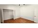 Bedroom features hardwood floors and closet for plenty of storage at 629 Sawgrass Bridge Rd, Venice, FL 34292