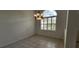 Dining room with tile floors and window with plantation shutters at 629 Sawgrass Bridge Rd, Venice, FL 34292