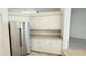 Kitchen with stainless steel refrigerator and lots of storage at 629 Sawgrass Bridge Rd, Venice, FL 34292
