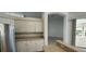 View from the kitchen into the living room at 629 Sawgrass Bridge Rd, Venice, FL 34292