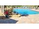 A beautiful swimming pool with comfortable lounge chairs on the deck at 629 Sawgrass Bridge Rd, Venice, FL 34292