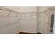 Spacious walk-in closet with metal shelving providing ample storage in a light space at 629 Sawgrass Bridge Rd, Venice, FL 34292