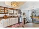 Beautiful kitchen featuring custom countertops, stainless steel appliances, and a stylish backsplash at 7892 S Leewynn Pl, Sarasota, FL 34240