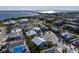 Aerial view of a beautiful waterfront community near the bay and beaches at 9 Palm Harbor Dr, Holmes Beach, FL 34217