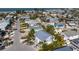 Aerial view of a lovely neighborhood with a home that's just a short distance from the beach at 9 Palm Harbor Dr, Holmes Beach, FL 34217