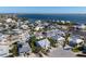 Aerial view of a charming waterfront community with stunning ocean views from this beautiful home at 9 Palm Harbor Dr, Holmes Beach, FL 34217