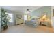 Relaxing bedroom with coastal decor and an abundance of natural light at 9 Palm Harbor Dr, Holmes Beach, FL 34217