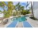 Beautiful backyard pool and patio area perfect for relaxation and entertaining at 9 Palm Harbor Dr, Holmes Beach, FL 34217