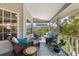 Relaxing porch with comfortable seating, providing a serene outdoor space to unwind at 9 Palm Harbor Dr, Holmes Beach, FL 34217