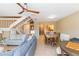 Bright and airy living room with comfortable seating, staircase, and open layout at 903 Pinellas Bayway S # 102, St Petersburg, FL 33715