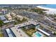 A condo building with a pool, conveniently located near the beach, with ample parking and lush landscaping at 915 Beach Rd # 318, Sarasota, FL 34242