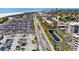 Aerial view of the condos and surrounding area with nearby parking and a close proximity to the beach at 915 Beach Rd # 318, Sarasota, FL 34242