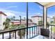 Enjoy serene views from the balcony, overlooking the pool area and surrounding landscape at 915 Beach Rd # 318, Sarasota, FL 34242