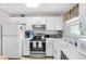 Well-maintained kitchen offers plenty of storage, ample counter space and updated appliances at 915 Beach Rd # 318, Sarasota, FL 34242