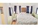 Serene bedroom featuring a comfortable bed and soft natural lighting at 10315 Cortez W Rd # 71-4, Bradenton, FL 34210