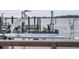 Beautiful view of the boats docked near the pier with white cranes nearby at 10315 Cortez W Rd # 71-4, Bradenton, FL 34210