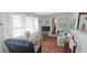 Cozy living room with tile flooring and comfortable furnishings at 10315 Cortez W Rd # 71-4, Bradenton, FL 34210