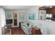 Inviting living area features a comfortable couch, stylish decor, and bright natural light at 10315 Cortez W Rd # 71-4, Bradenton, FL 34210