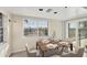 Charming dining area featuring a scenic view of the water and access to a balcony at 1762 Bay St # 401, Sarasota, FL 34236