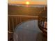 Enjoy breathtaking sunset views from the balcony with a charming table and stylish lantern at 2625 Terra Ceia Bay Blvd # 503, Palmetto, FL 34221
